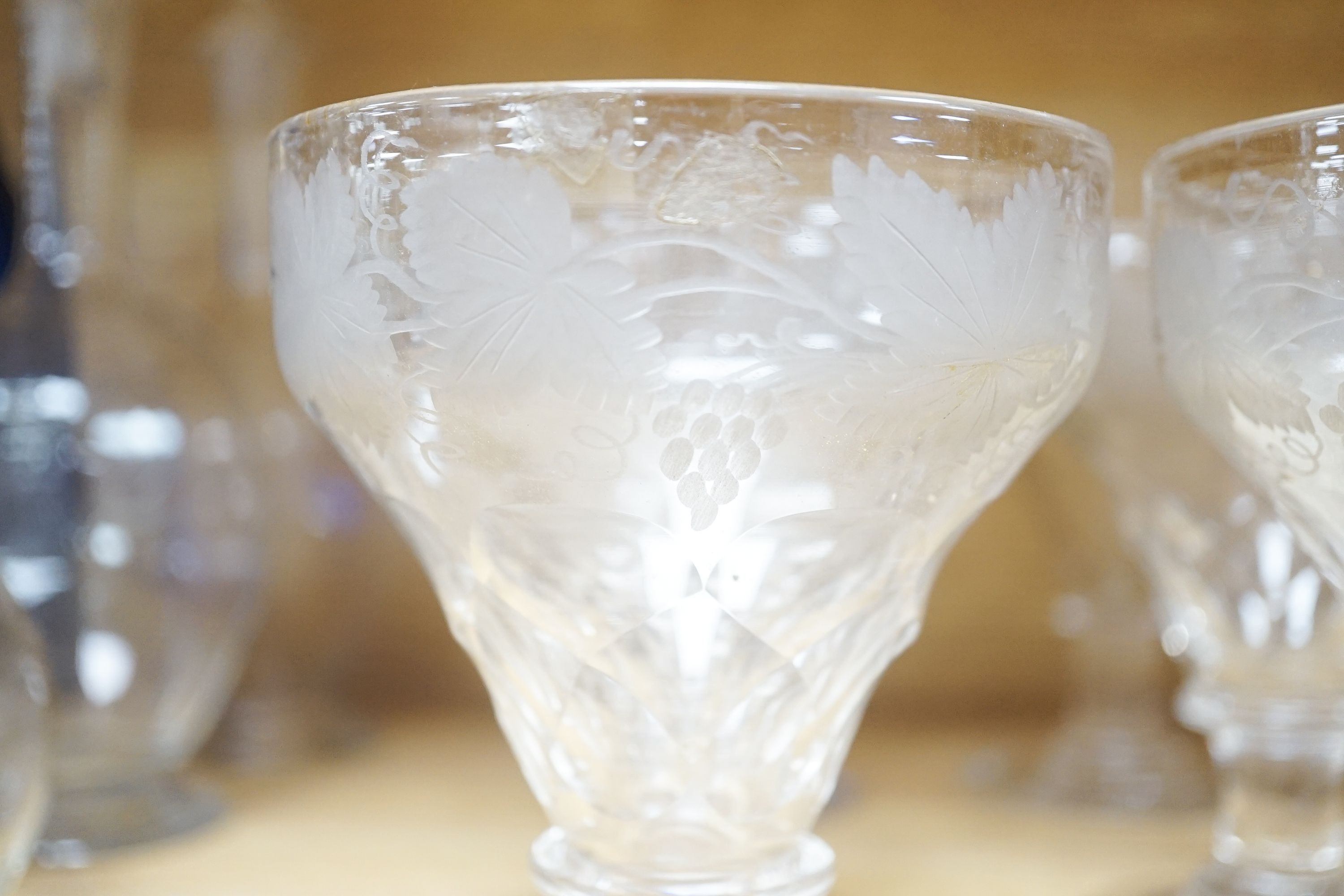 A Lalique frosted glass bird, etched Wedgwood ‘plant a tree ‘73’ glass, other etched glasses, decanters and blue glass pharmacy bottles